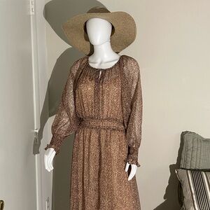 MNG dress, animal print with details in gold.